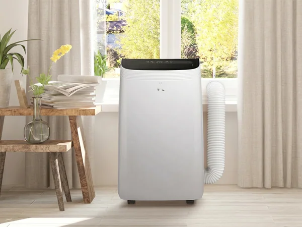 Klimatyzator przenośny TCL TAC-12CPB/MZW 3,5 kW w jasnym salonie z rurą wyprowadzającą ciepłe powietrze przez okno